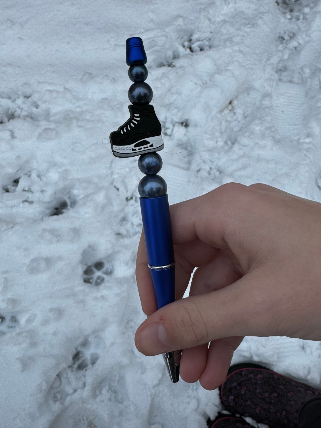Blue pen with ice skate