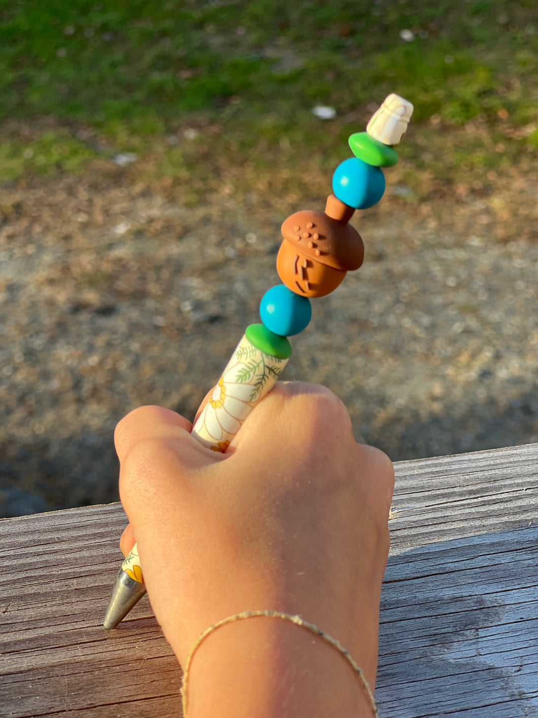 Flower pen with acorn and blue/green beads